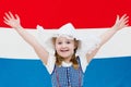 Dutch child with flag of Netherlands